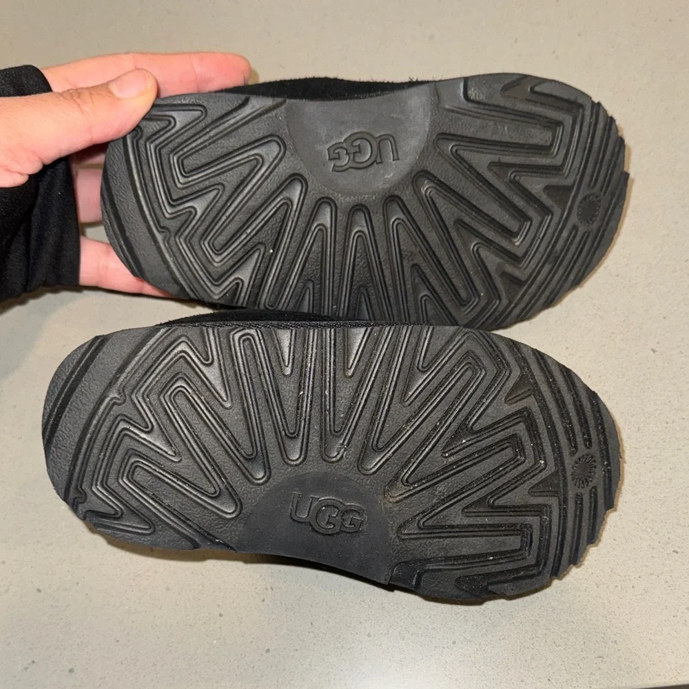 Uggs kid’s Black Suede Faux-Fur Lined Slip-On Slippers